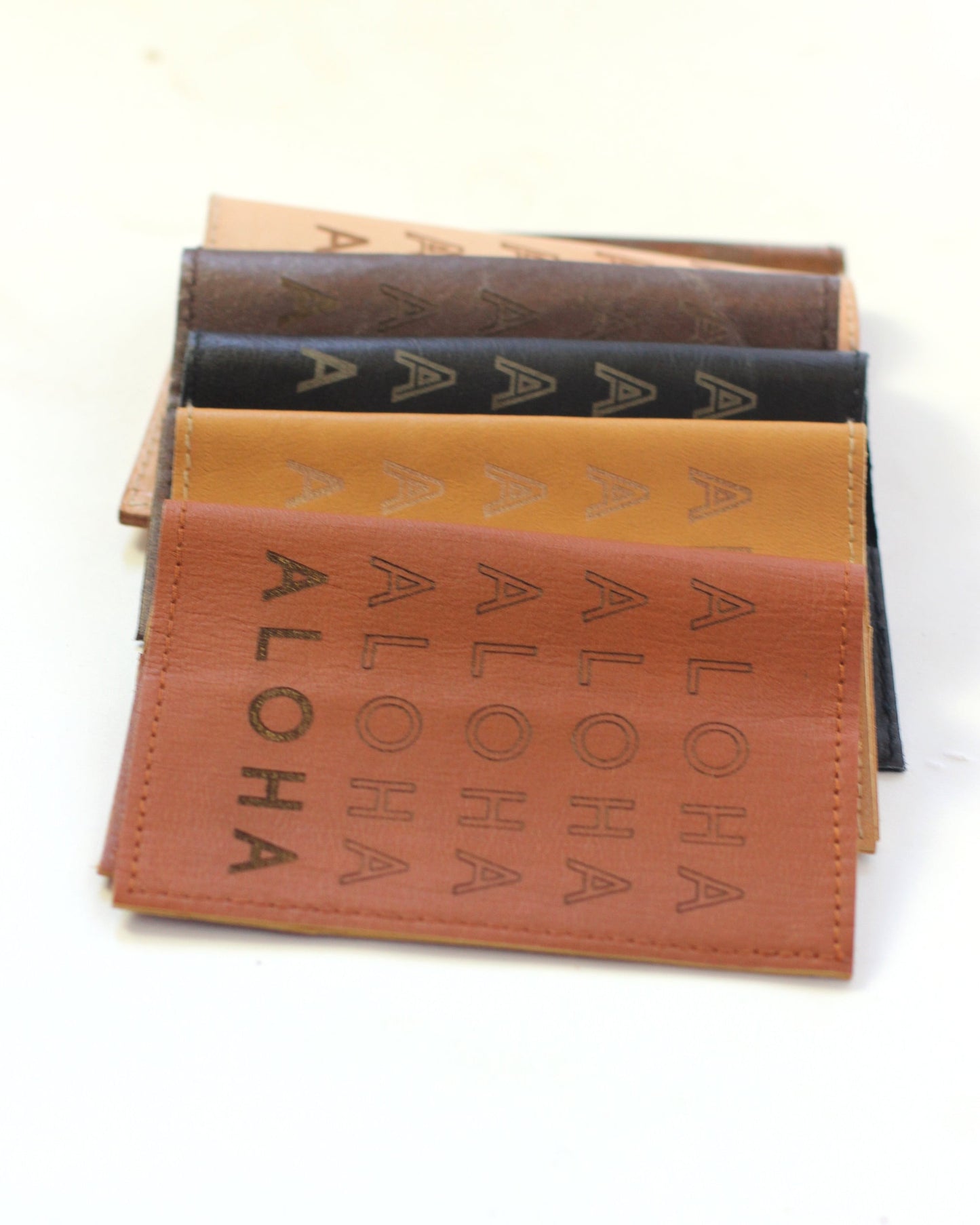 Leather Passport Holder | Infinity Aloha embossed | Assorted colors