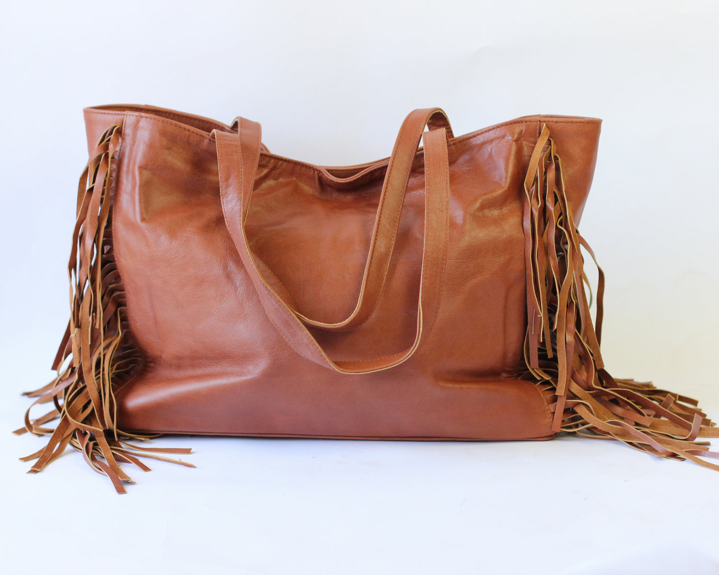 Lynda leather tote with side fringe | Assorted colors